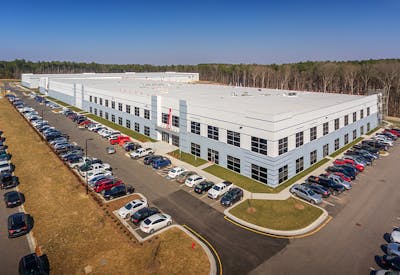 Exterior view showing full parking lot