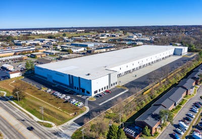 Aerial view showing loading docks and parking