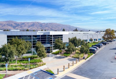 Elevated view of front entrance showing parking