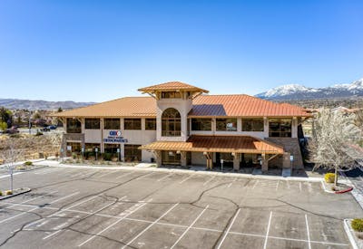 Front of building with parking lot