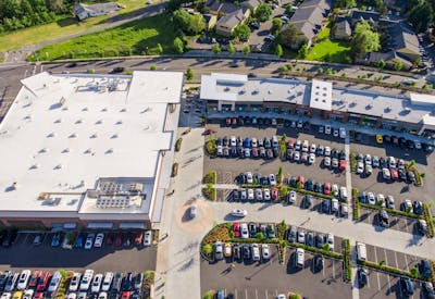 Aerial photo of buildings and parking lot